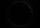 Totality through a solar filter, click to load a larger version
