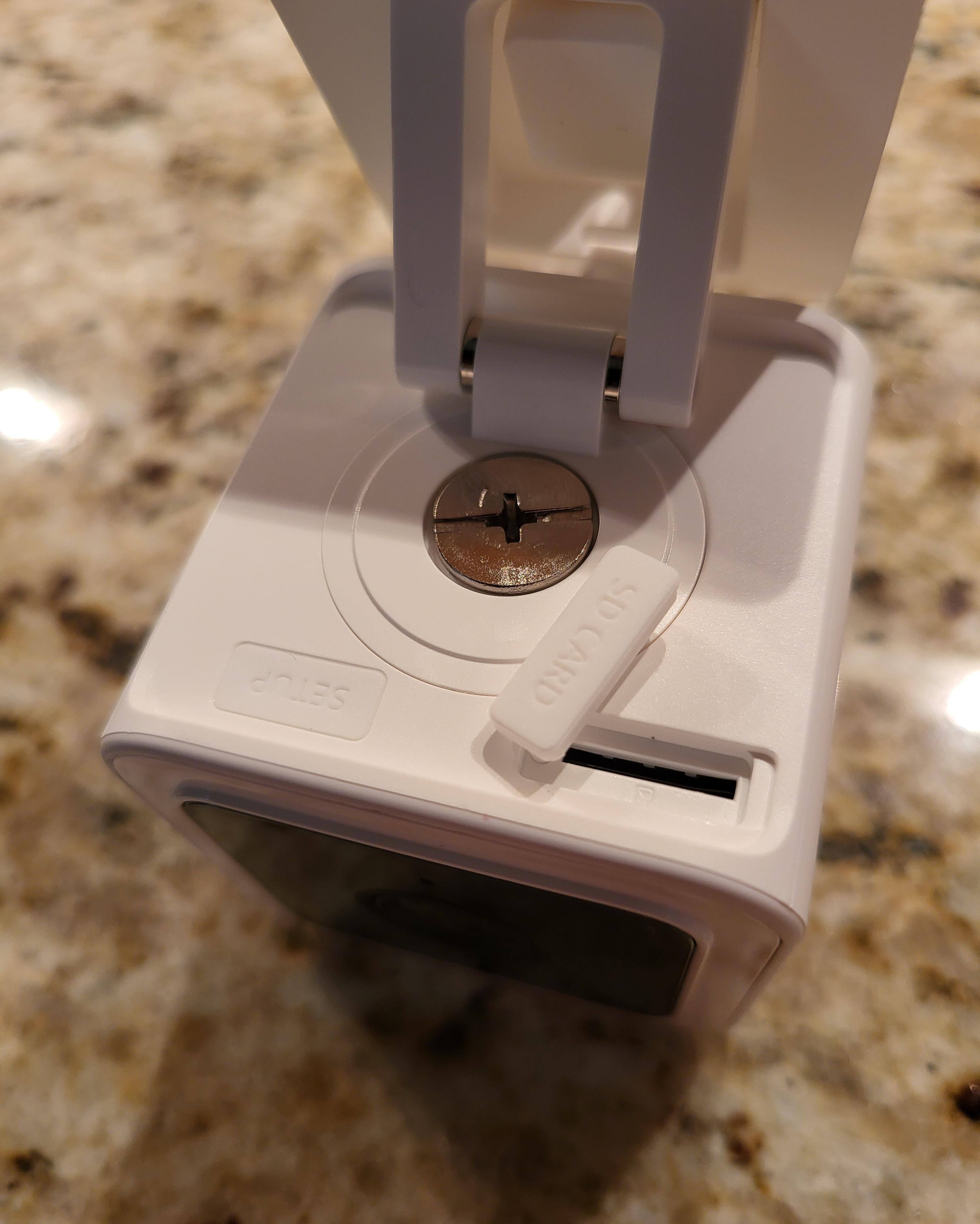 SETUP button and microSD slot underneath, click to load a larger version