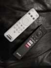 Projector and Android TV remote., click to load a larger version