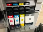 Ink tanks will click to let you know they're correctly inserted., click to load a larger version