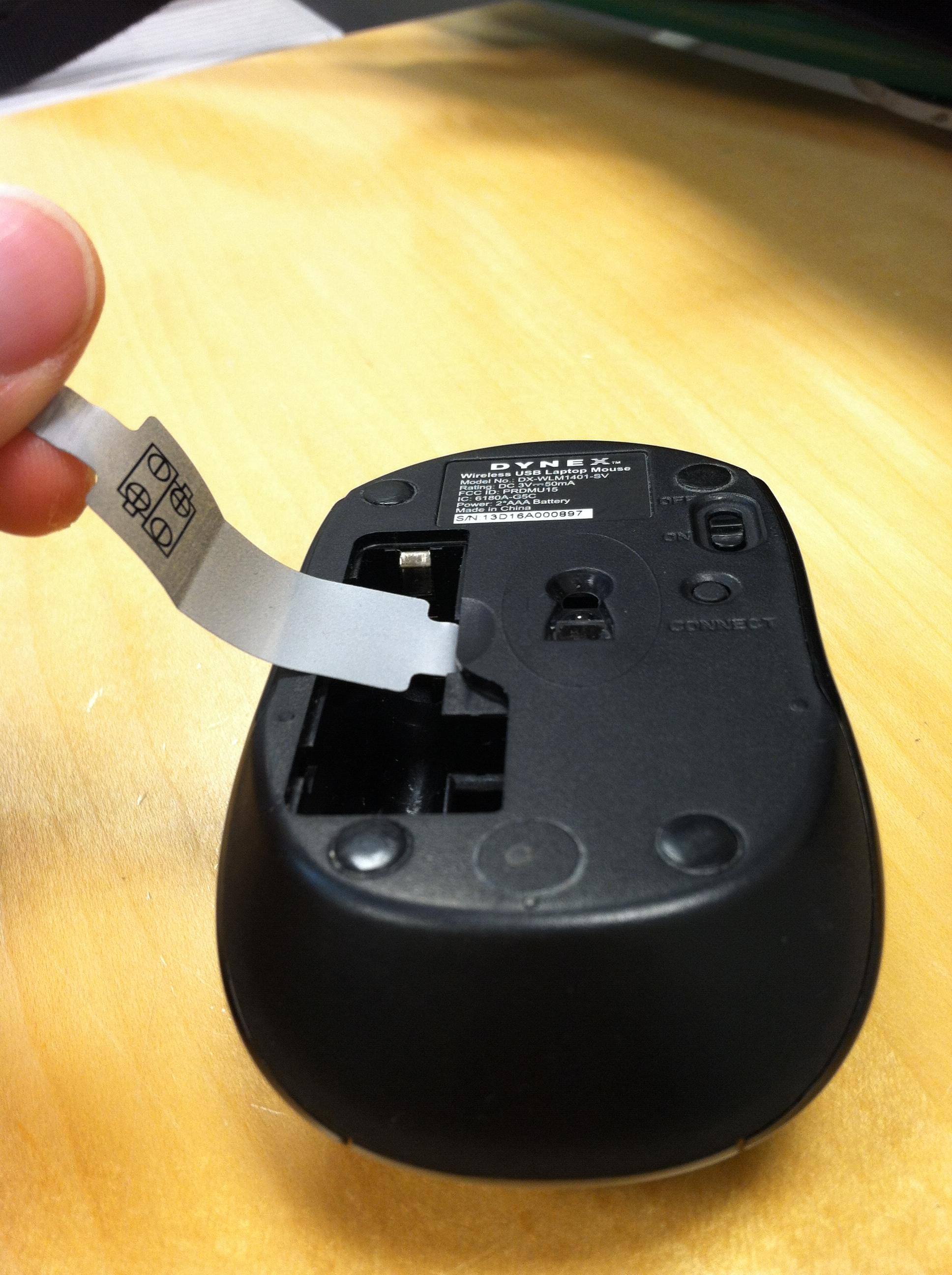 the plastic sheet on the battery slot, click to load a larger version