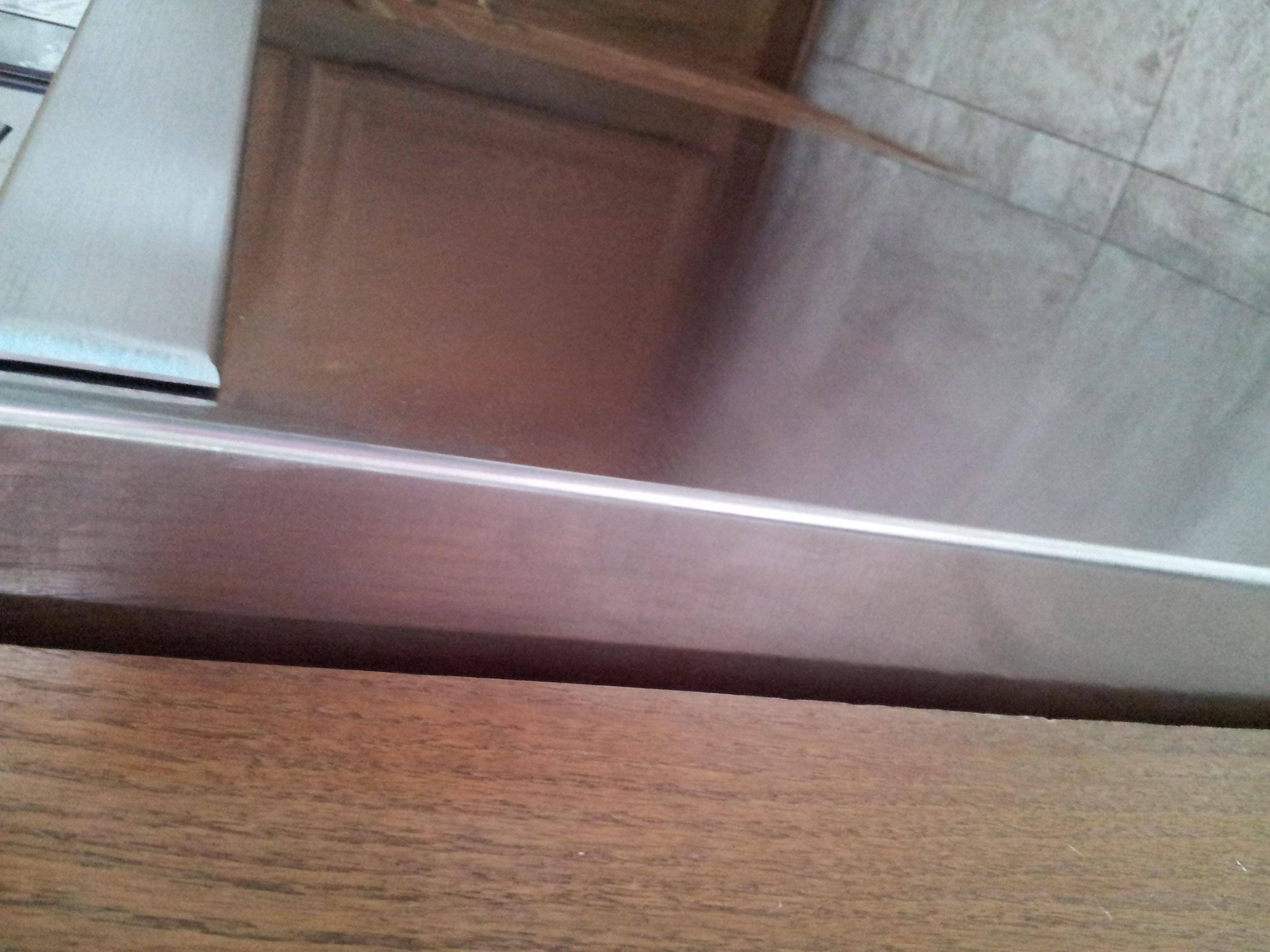 Sticks out about an inch, may be installation issue. Sorry about the rotation., click to load a larger version