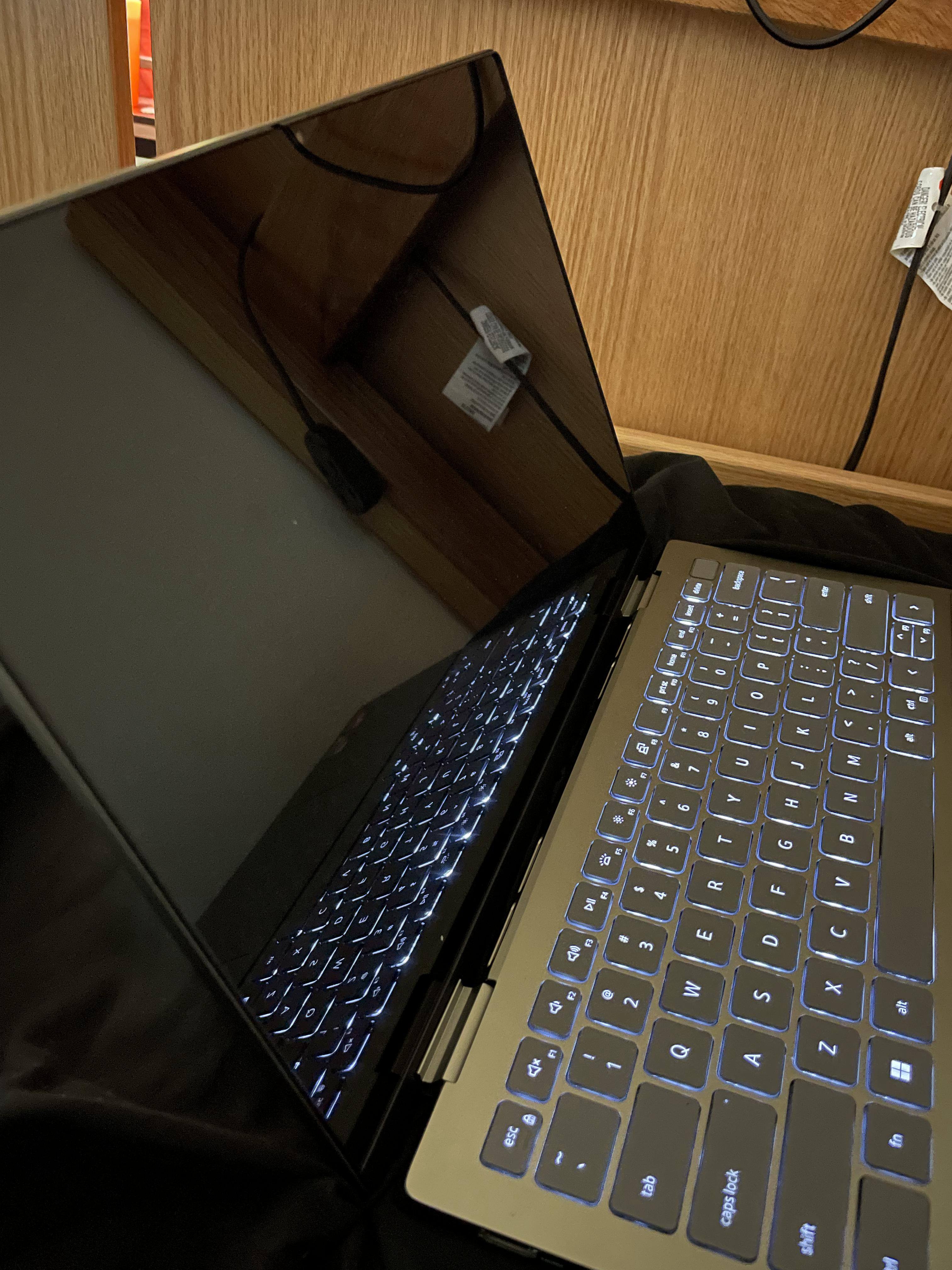 While off, the screen is so reflective I can use it to clearly watch what's going on behind my back., click to load a larger version