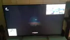 The image in the top right corner is a webcam. The rest is darkness because this TV has bad black levels, click to load a larger version