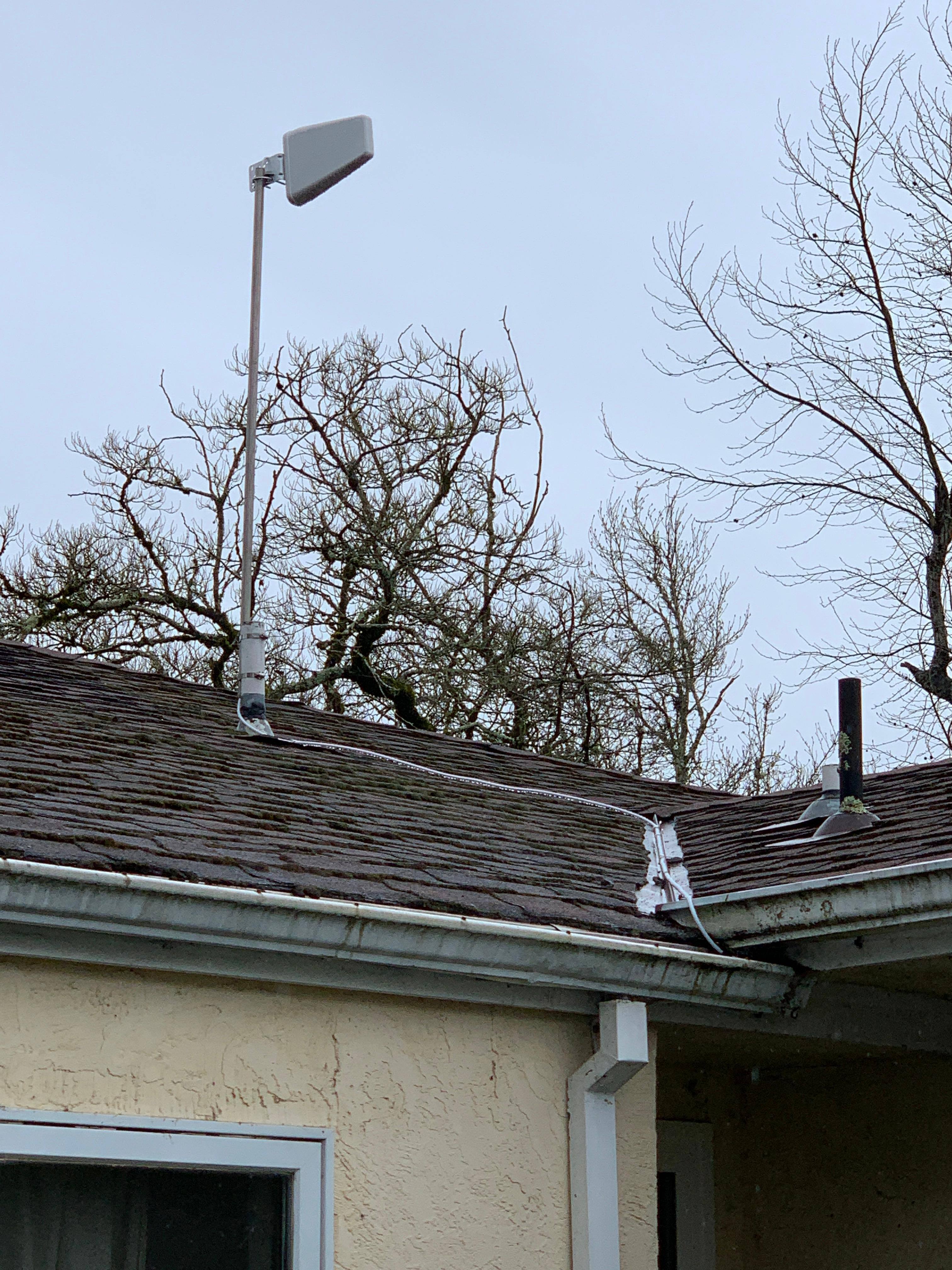 Outside attacthche to plumbing vent aimed towards cell tower, click to load a larger version