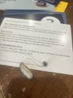 Hearing aid- I chose the gold color to blend with my gray/gold hair, click to load a larger version