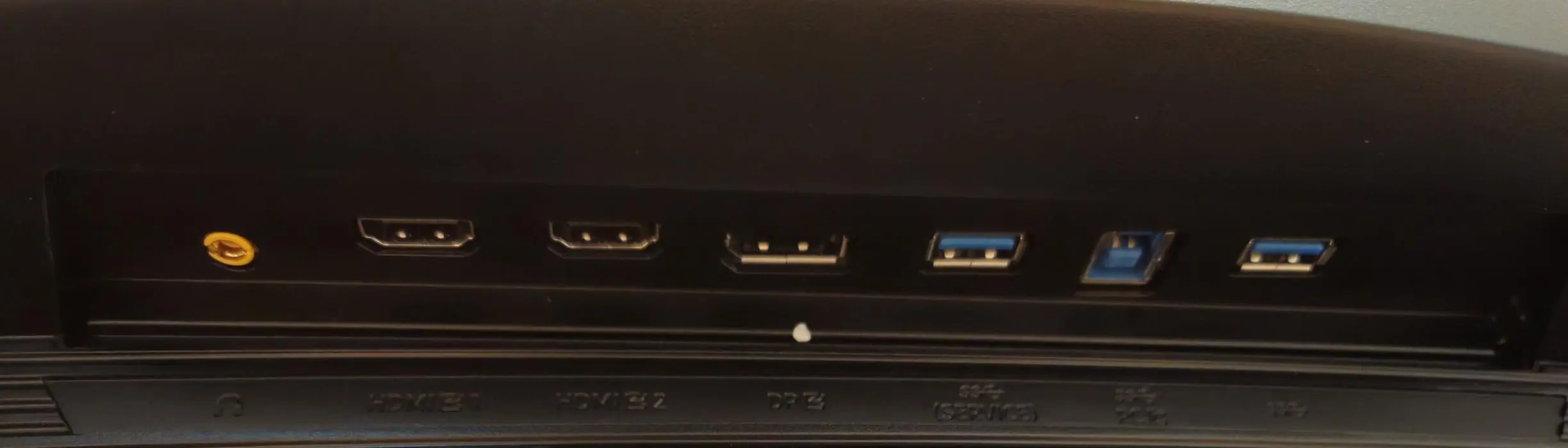 Included ports on the back are: Headphone Jack, 2xHDMI, 1xDisplayPort, 2xUSB-A (for devices), 1xUSB-B (for PC)., click to load a larger version
