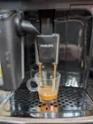 Making an espresso! The dispensing head adjusts for various sized glassware. The milk dispenser does NOT adjust though., click to load a larger version