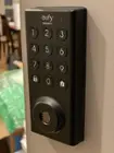 A closeup of the keypad and keyhole accessible from the outside of the property, click to load a larger version