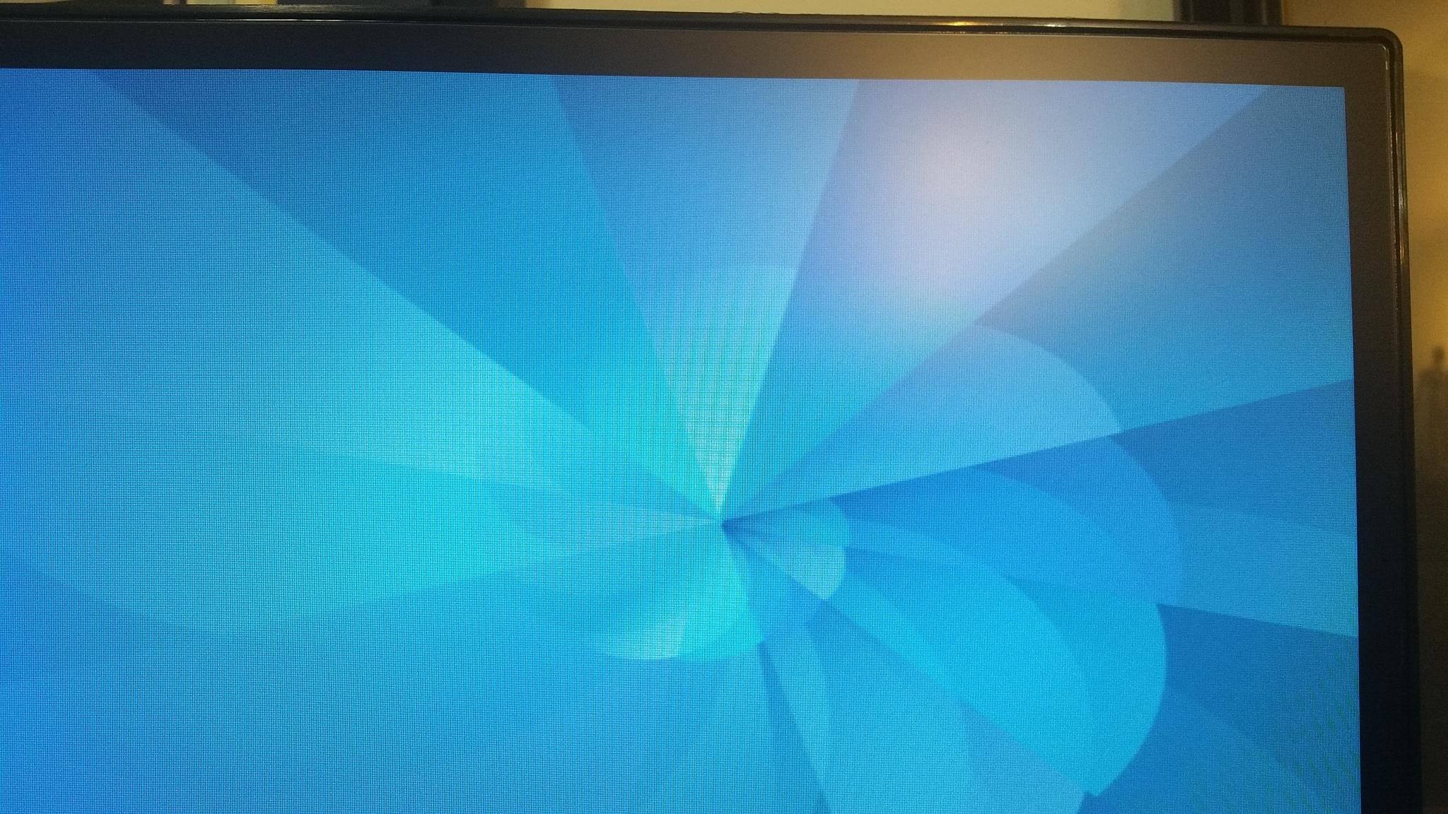 The bezel on the top three edges looks like this., click to load a larger version