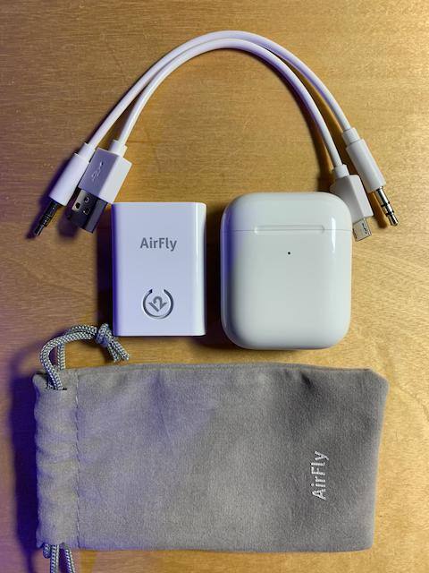 Size Comparison with AirPods, click to load a larger version