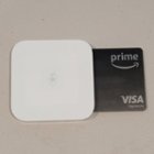 Reader with dipped credit card, click to load a larger version