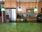 Kitchen with green light., click to load a larger version