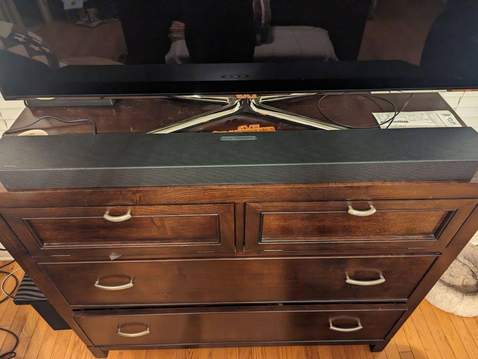 Soundbar fits snugly, low profile design works perfectly with Samsung TV, click to load a larger version