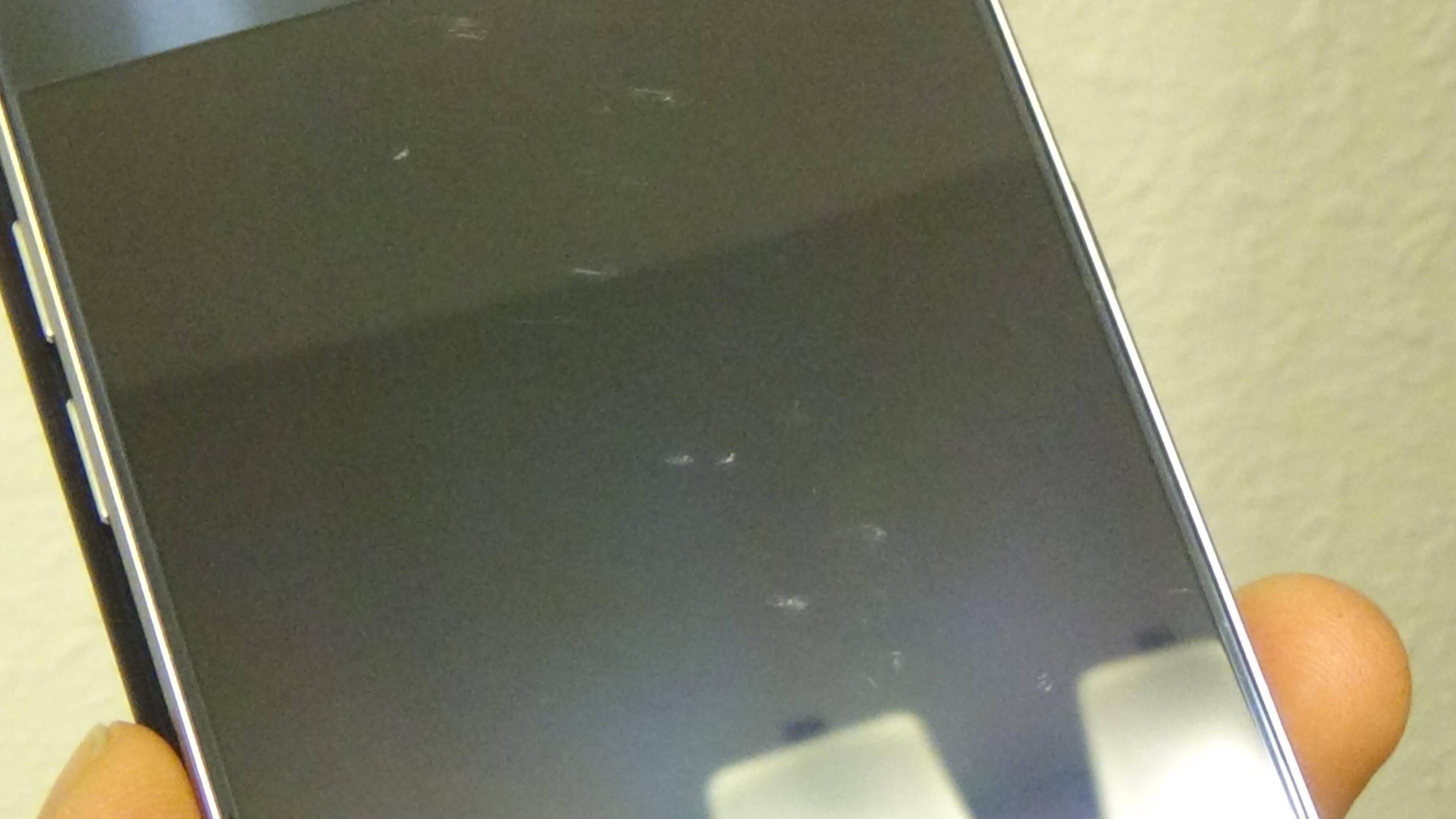 Those are scratches in the screen., click to load a larger version