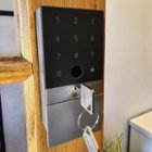 U100 hidden keyhole for physical key entry, click to load a larger version
