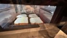 Beautiful view through the large glass door shows how the food is progressing., click to load a larger version