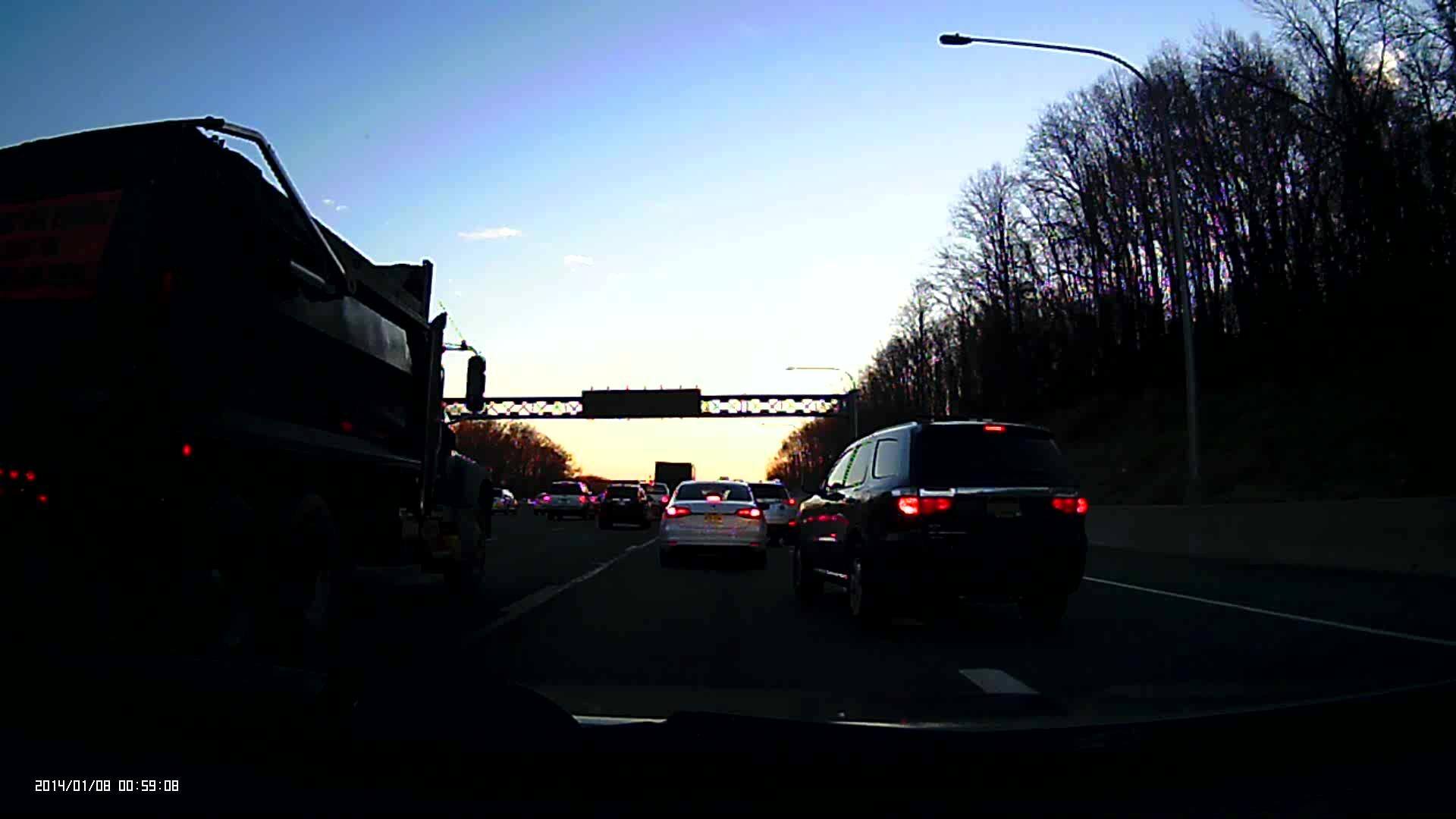 During the day it's dark and can barely read plates, click to load a larger version