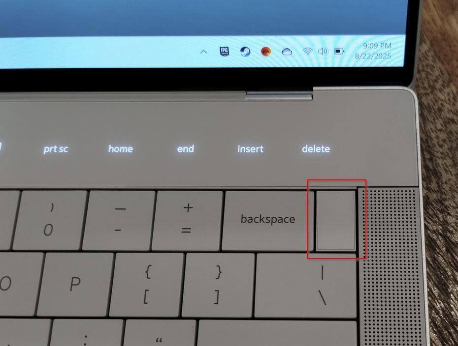 This picture shows the power button which is also the fingerprint reader., click to load a larger version