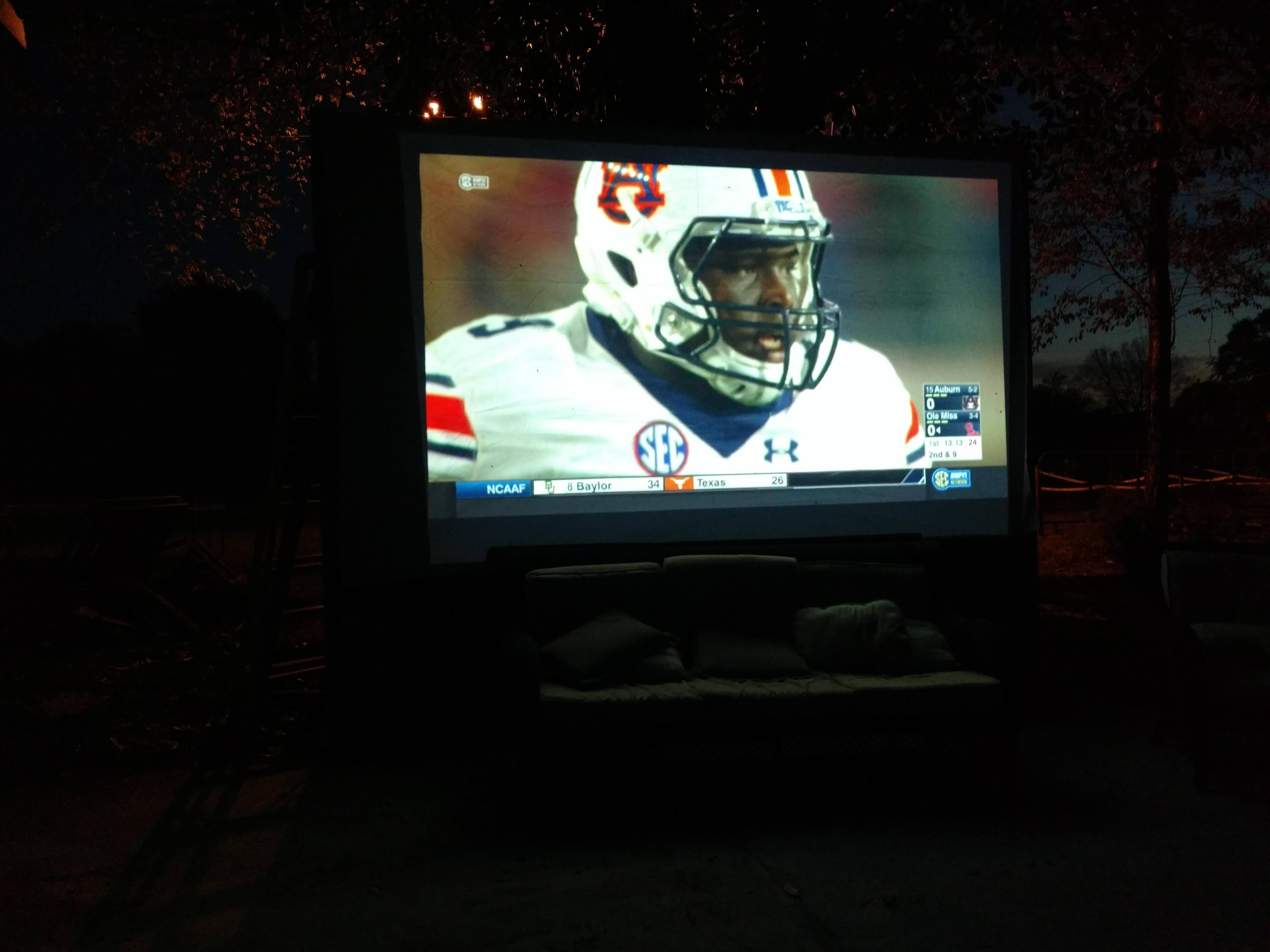 DirecTV on dropcloth 9'x12. you'll see couch below the AU football game., click to load a larger version