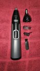 Handle with rotating trimmer, trimmer head, guards and brush., click to load a larger version