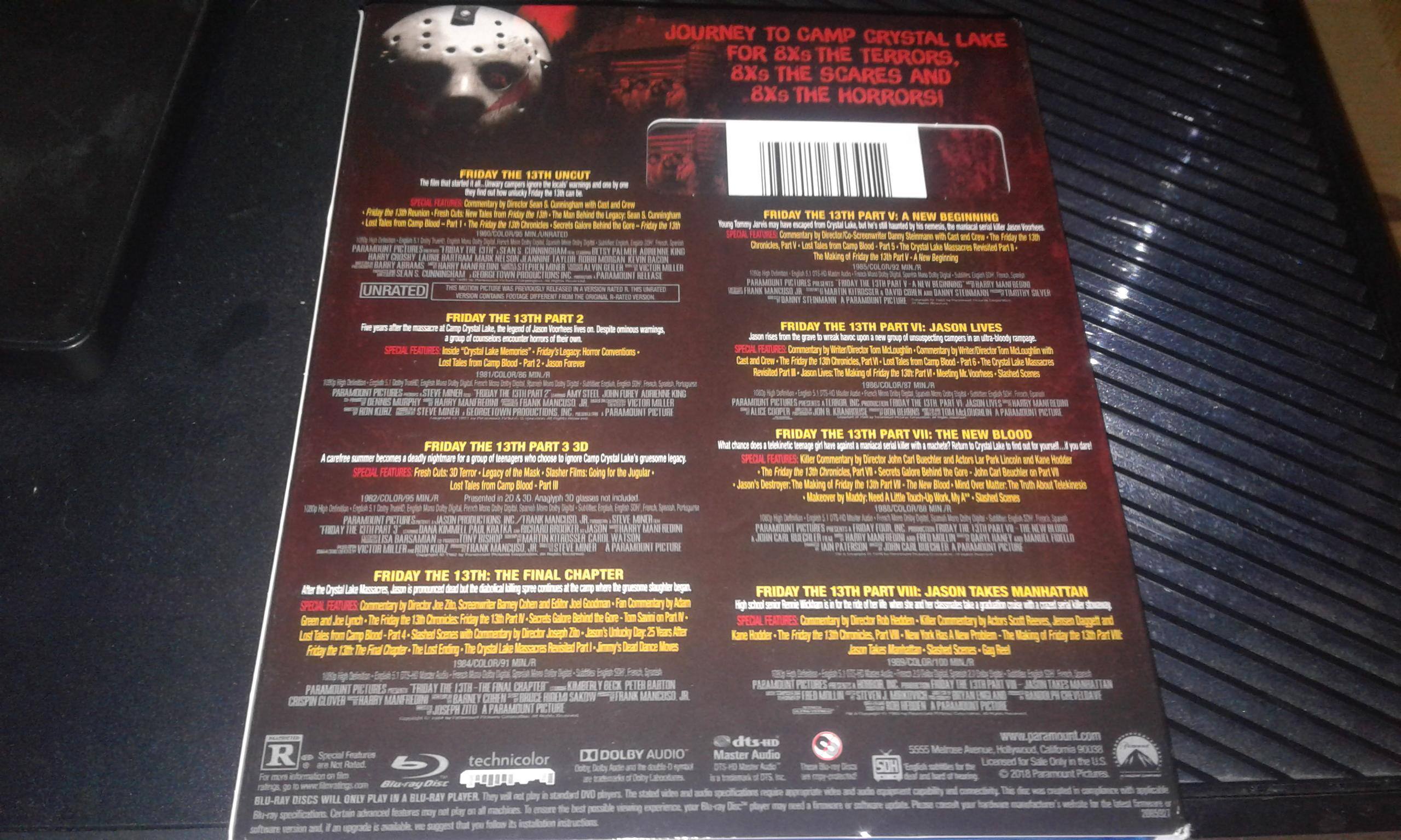 The back of the case laying all 8 movies, click to load a larger version