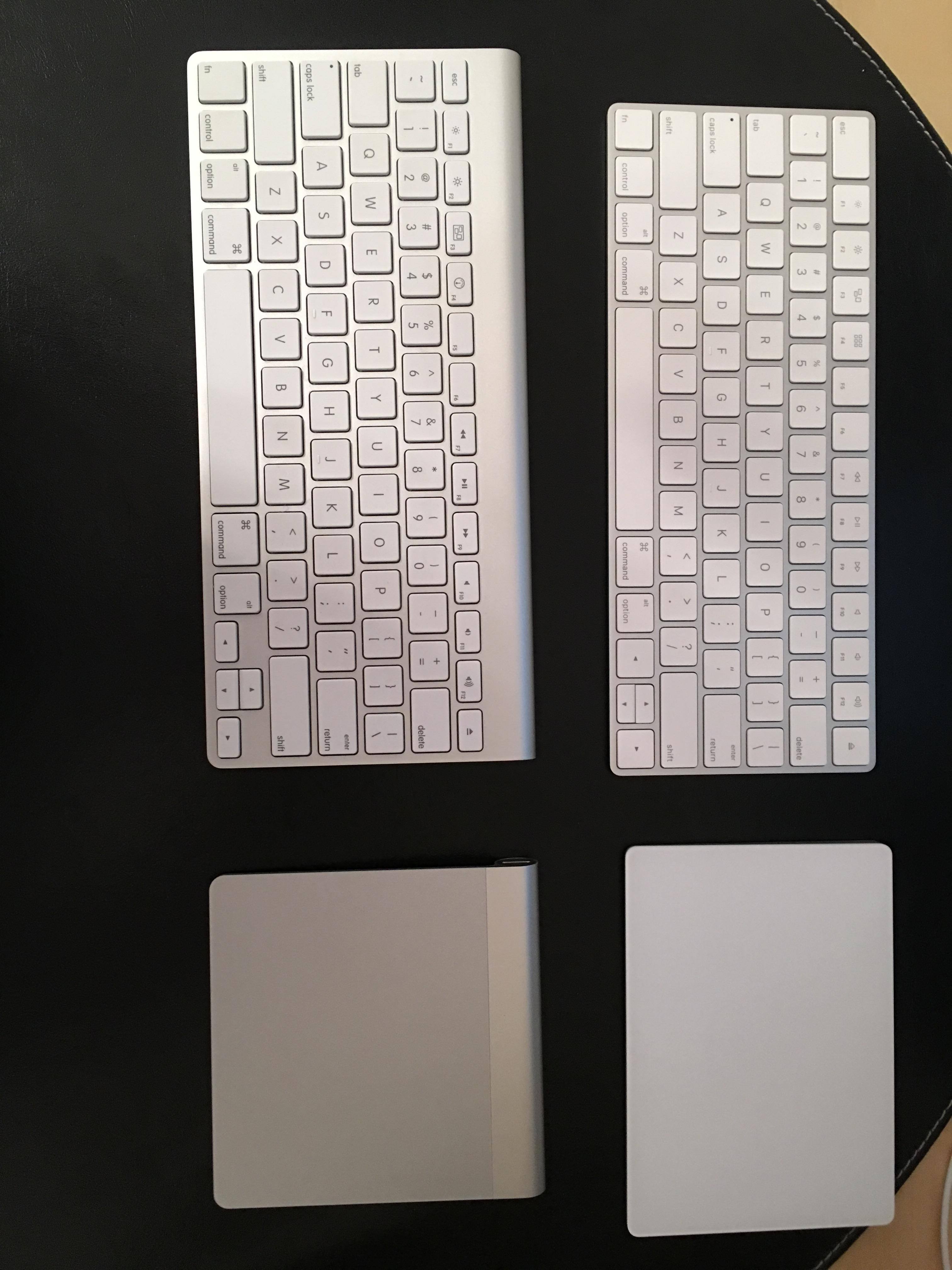 New keyboard and track pad on right...I do like the old keyboard feel better., click to load a larger version