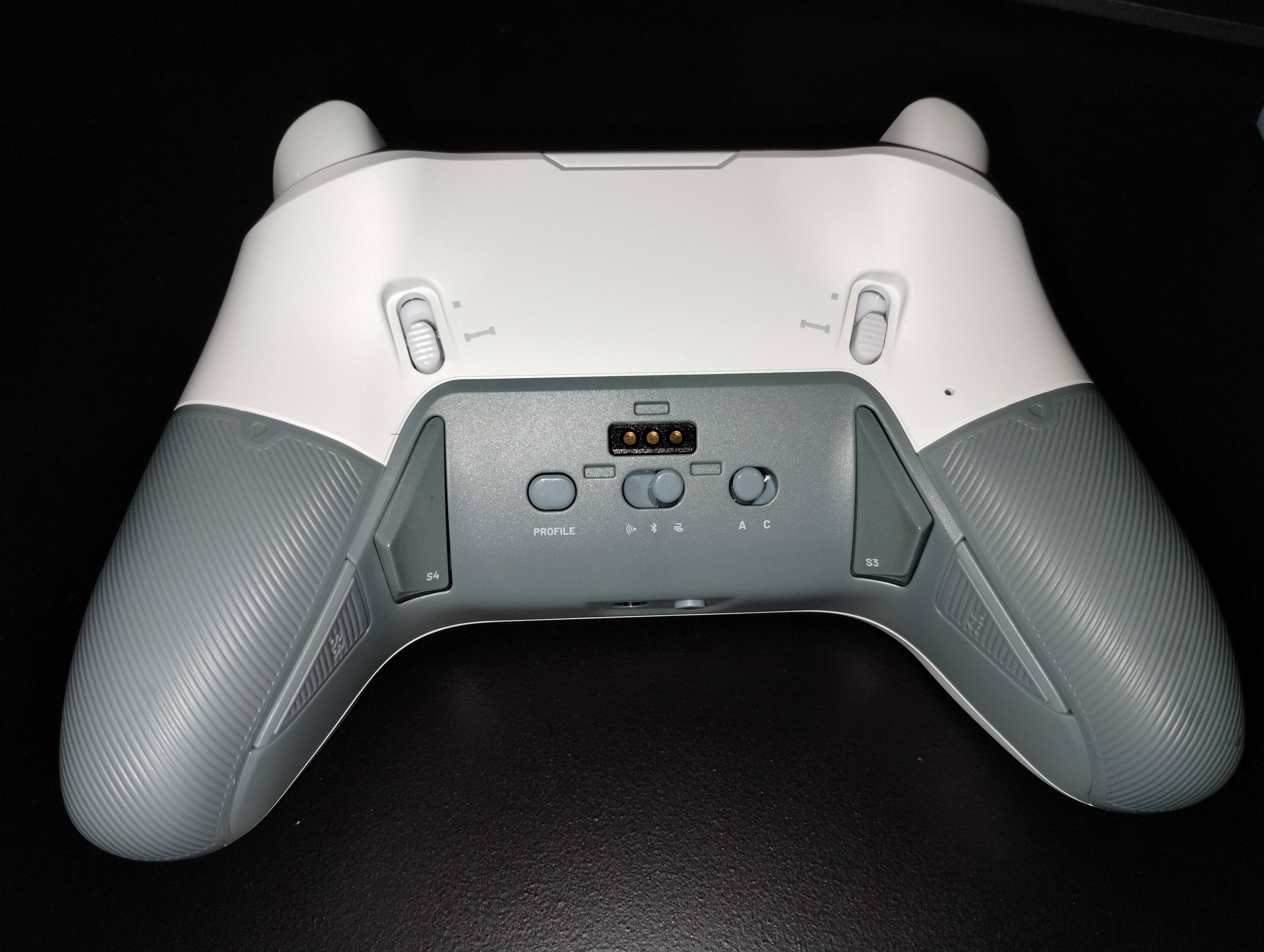 Here's the bottom of the controller.  Notice the very small icons for the three way connection setting switch.  The one on the right shows a wire, but it's almost impossible to see, at least for me., click to load a larger version