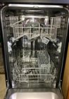 Top rack height adjusts and fold down dish guides, click to load a larger version