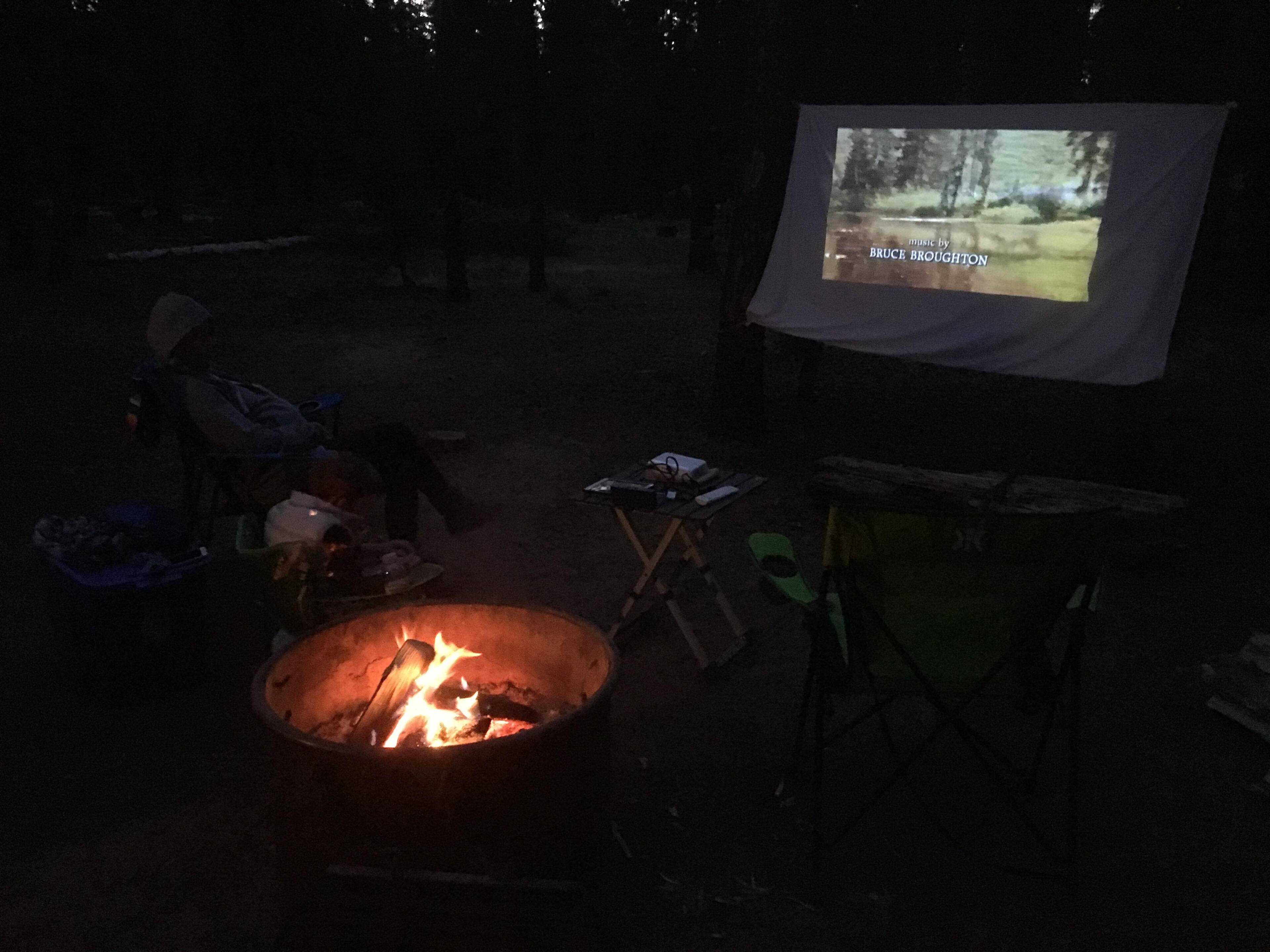 Camping movie projected on a sheet, click to load a larger version