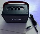 Speaker and AC charging cord., click to load a larger version