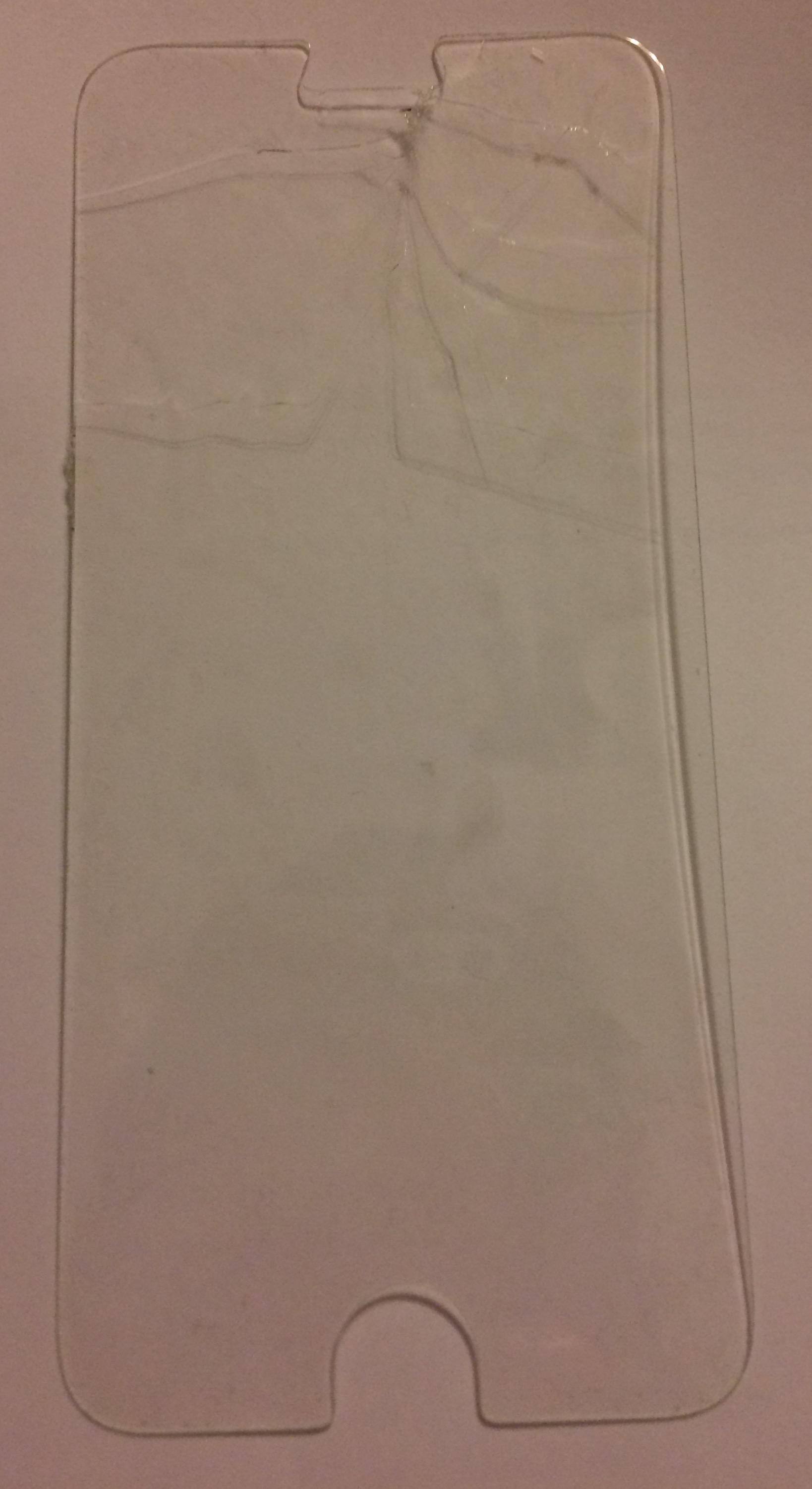 Shattered Invisible Shield removed from iPhone, click to load a larger version