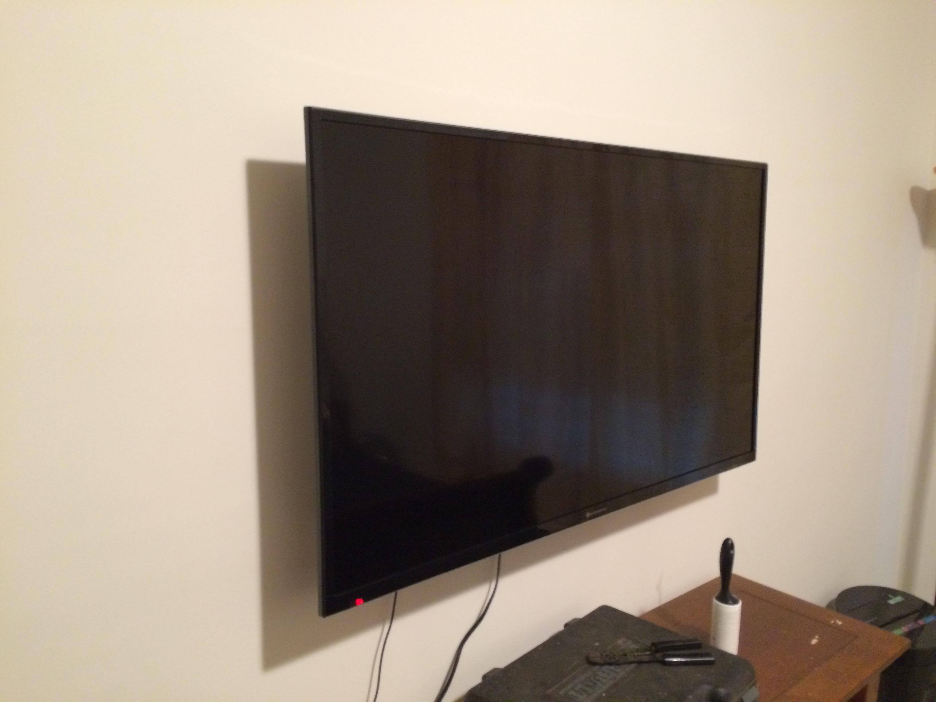 The 55" TV on the wall, click to load a larger version