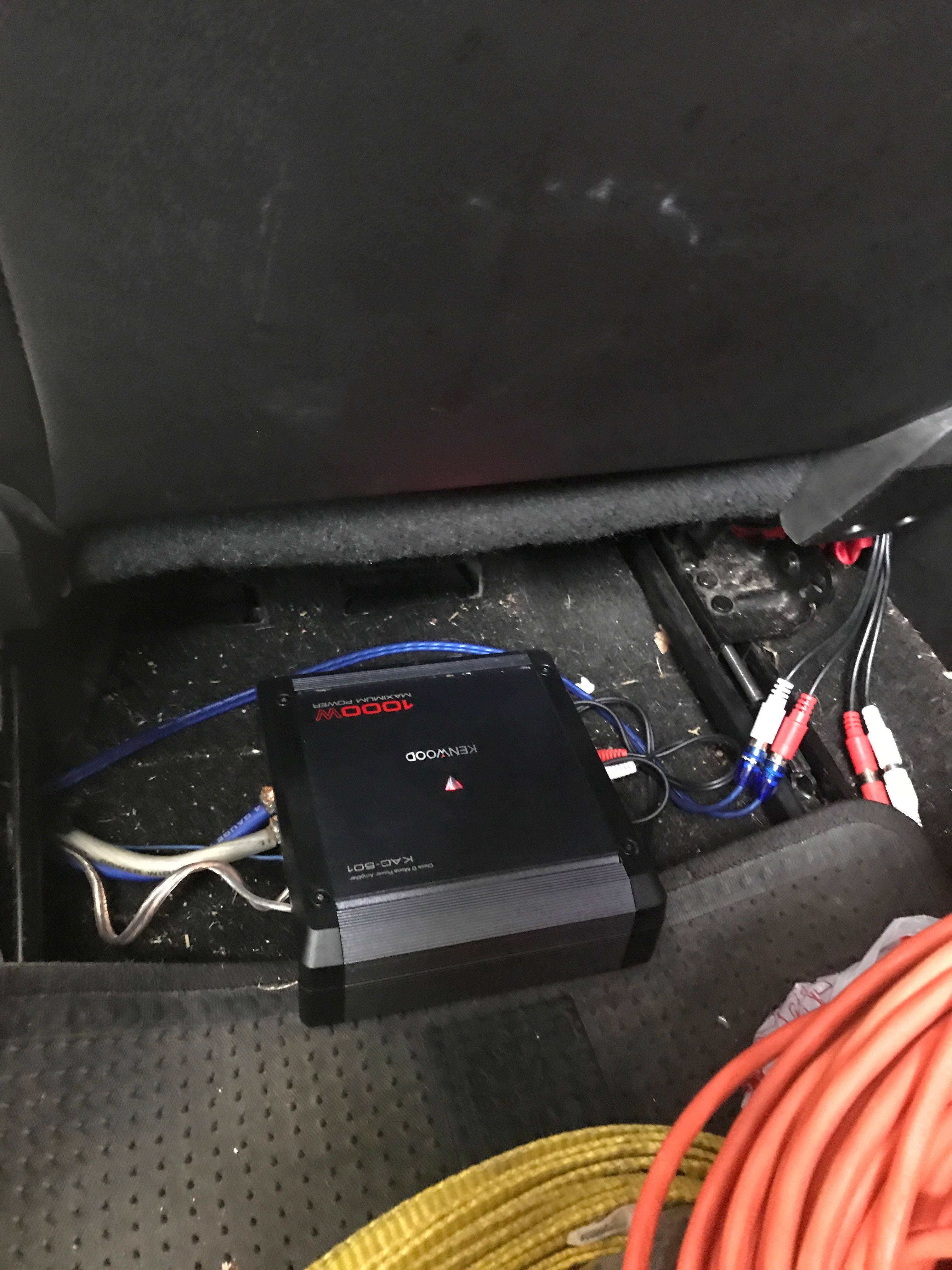 Amp under front seat of truck.., click to load a larger version