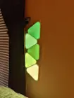 The bright spots in each corner and the faint lines over the top of each panel that show up in these photos aren't visible in real life. In person, the light looks much more like you get in the professional promotion photos., click to load a larger version