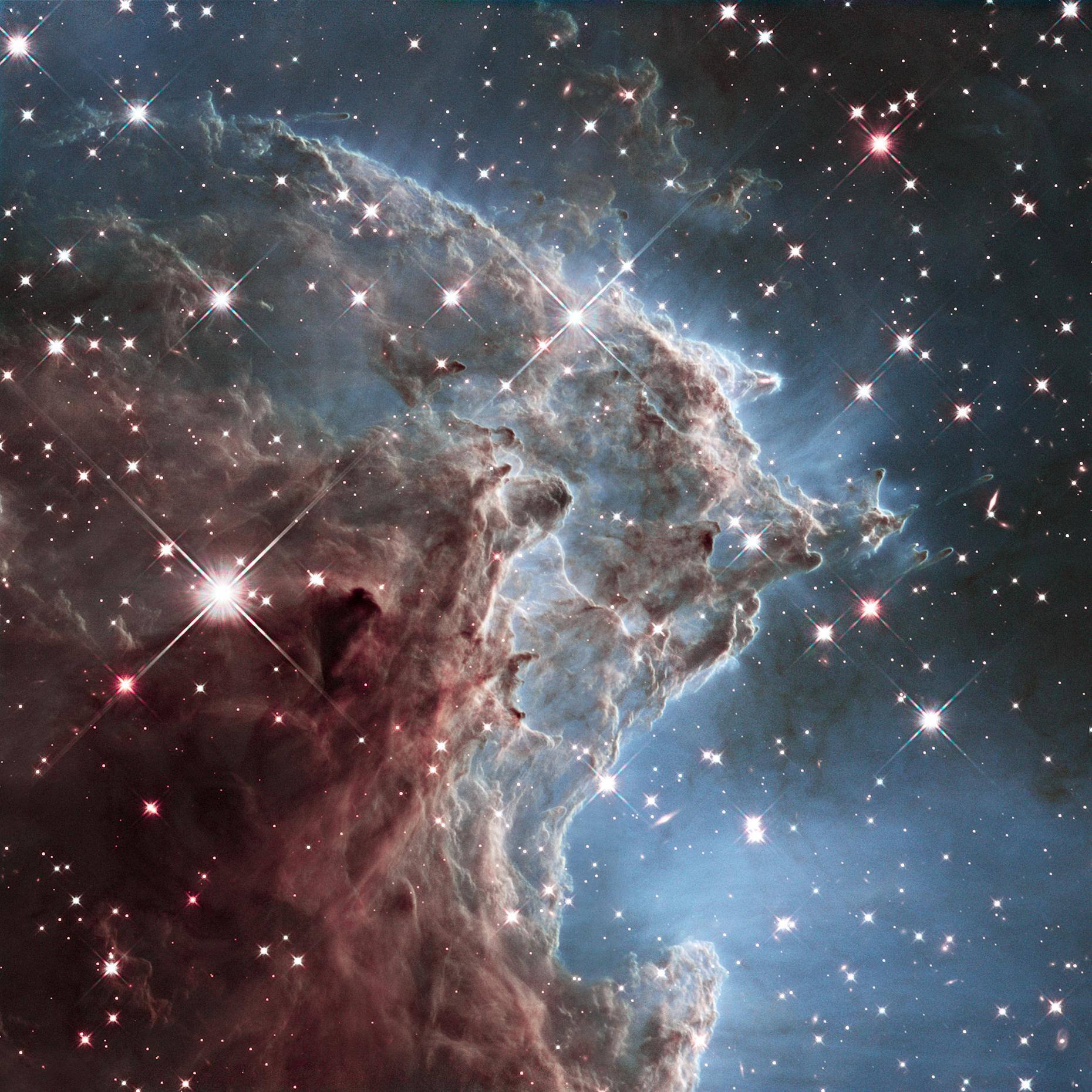 NGC 2174, the Monkey Head Nebula, located 6,400 light-years from Earth, click to load a larger version