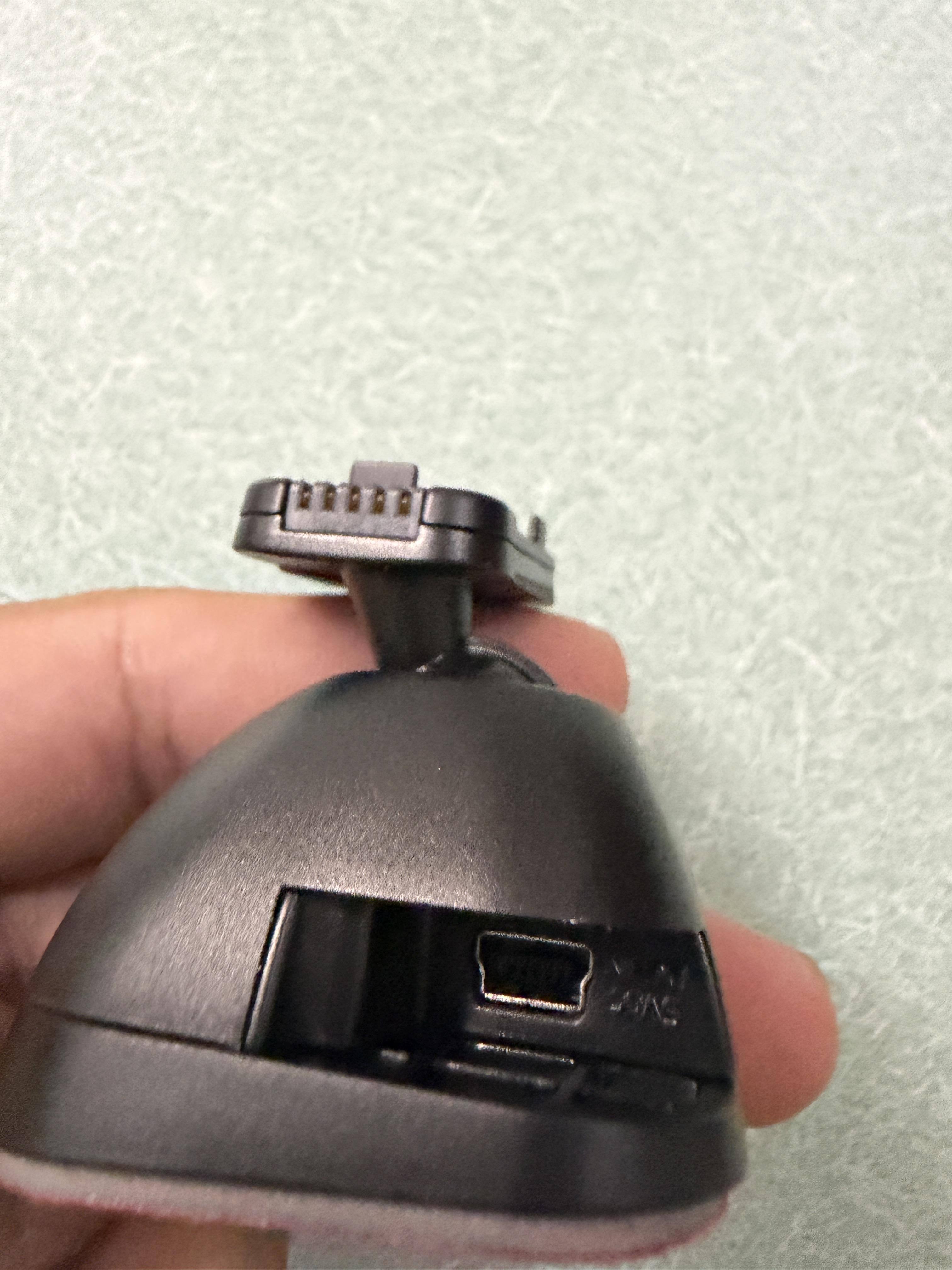 Base that goes into the windshield. This is where the power cable plugs into and the camera attaches with magnets, click to load a larger version
