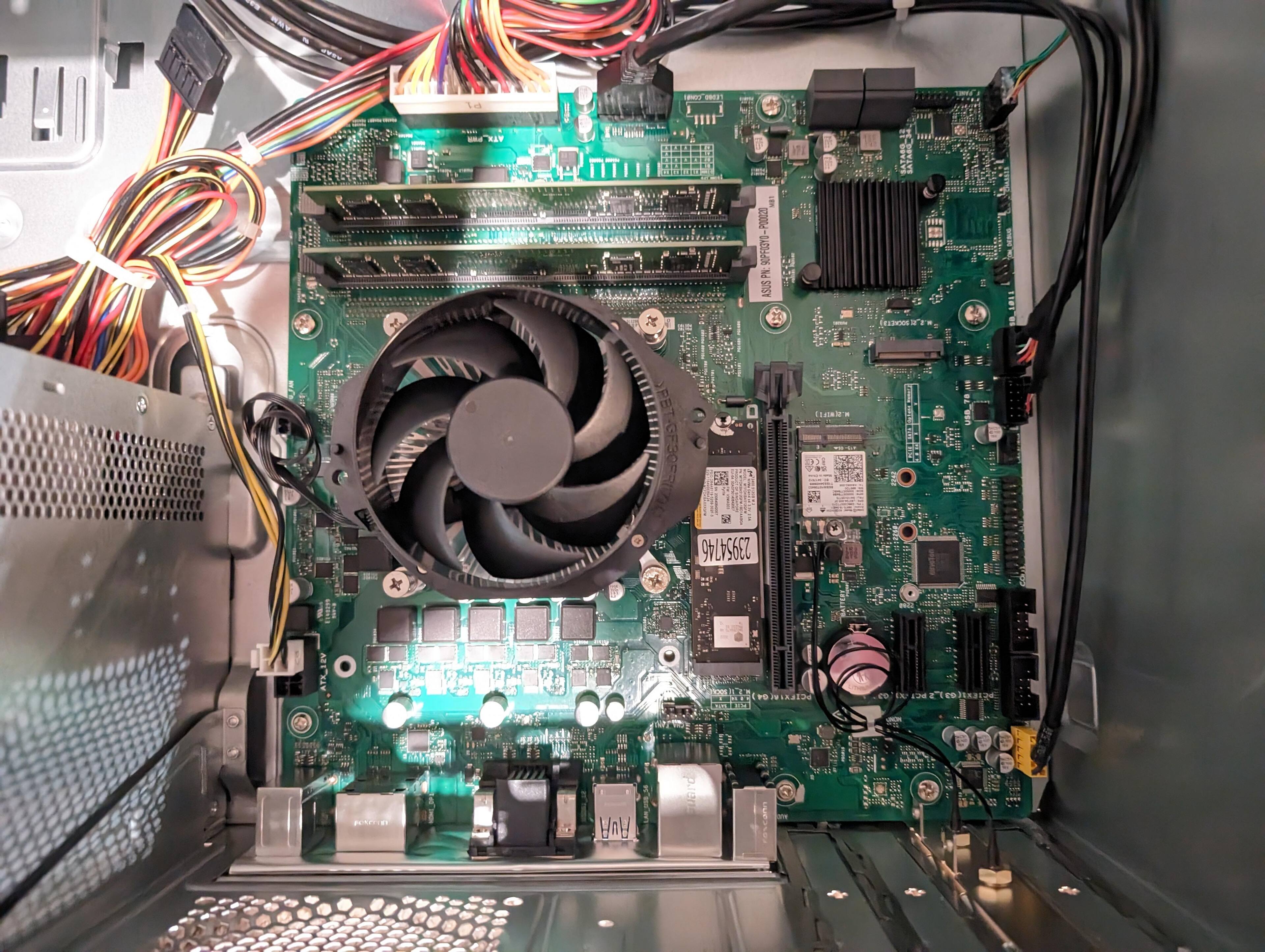 Picture of this desktop's motherboard. Note the available expansion slots., click to load a larger version