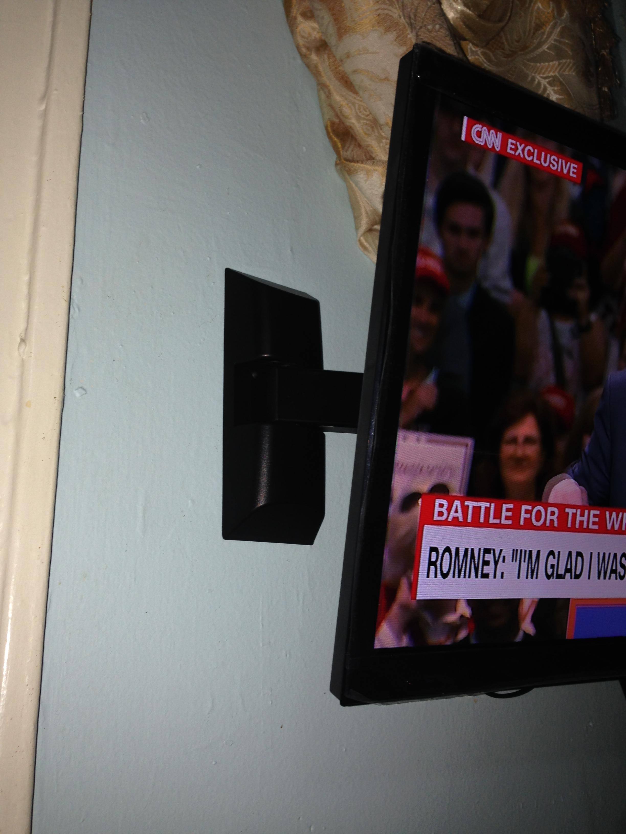 TV pressed against the wall, click to load a larger version