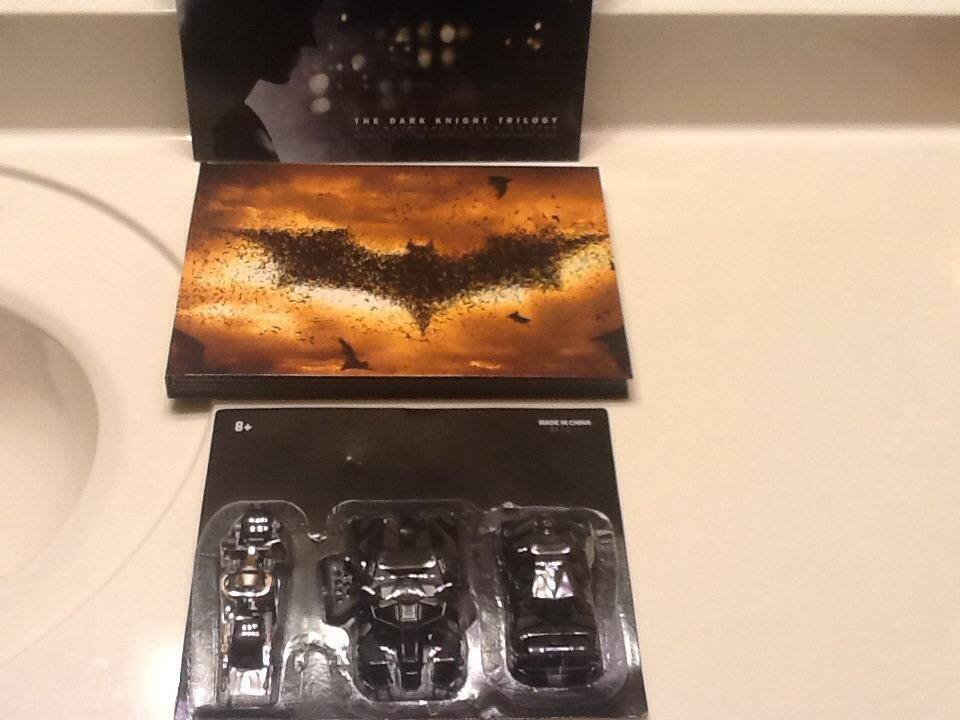 The book is amezing and it came with 3 batmobile models ., click to load a larger version