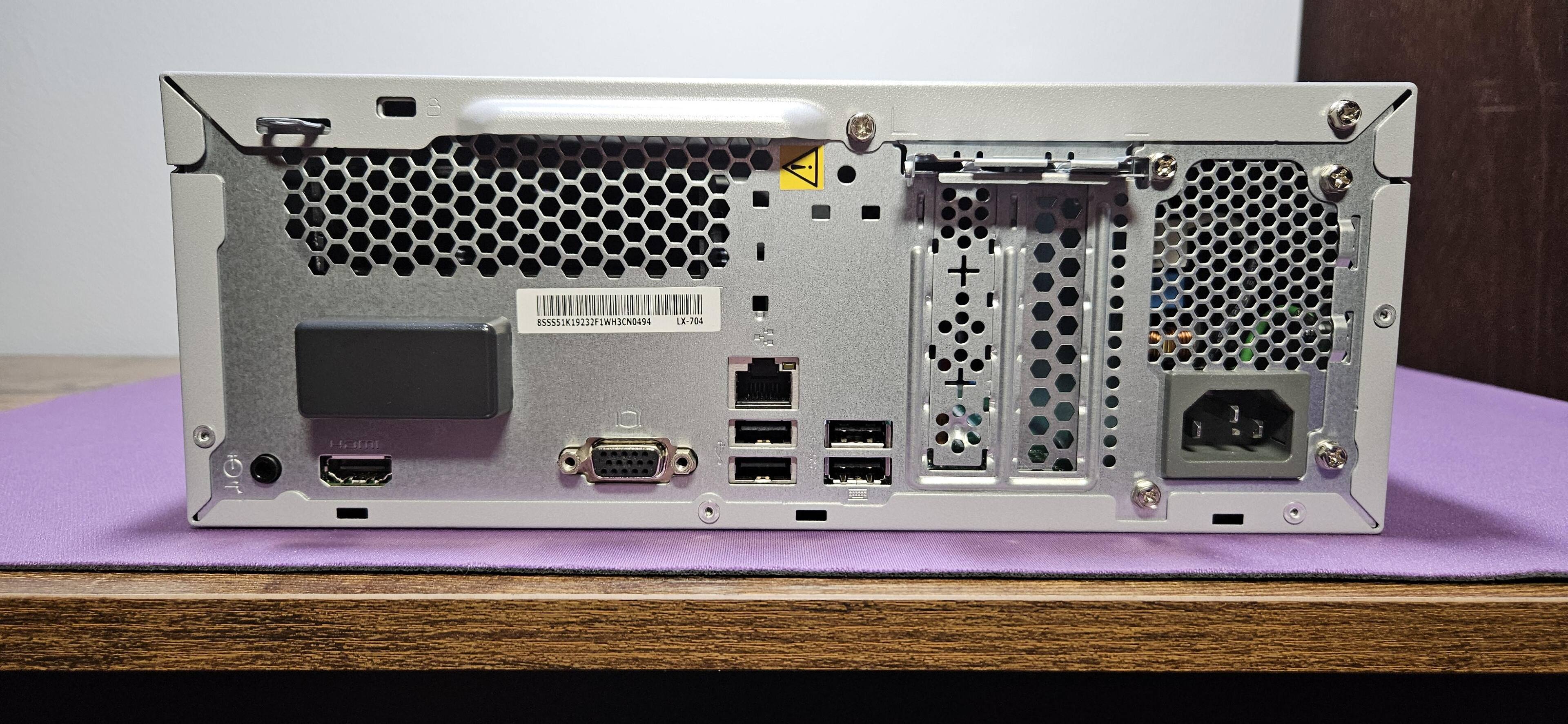 Good connectivity options on the back panel, limited but enough for simple office use., click to load a larger version