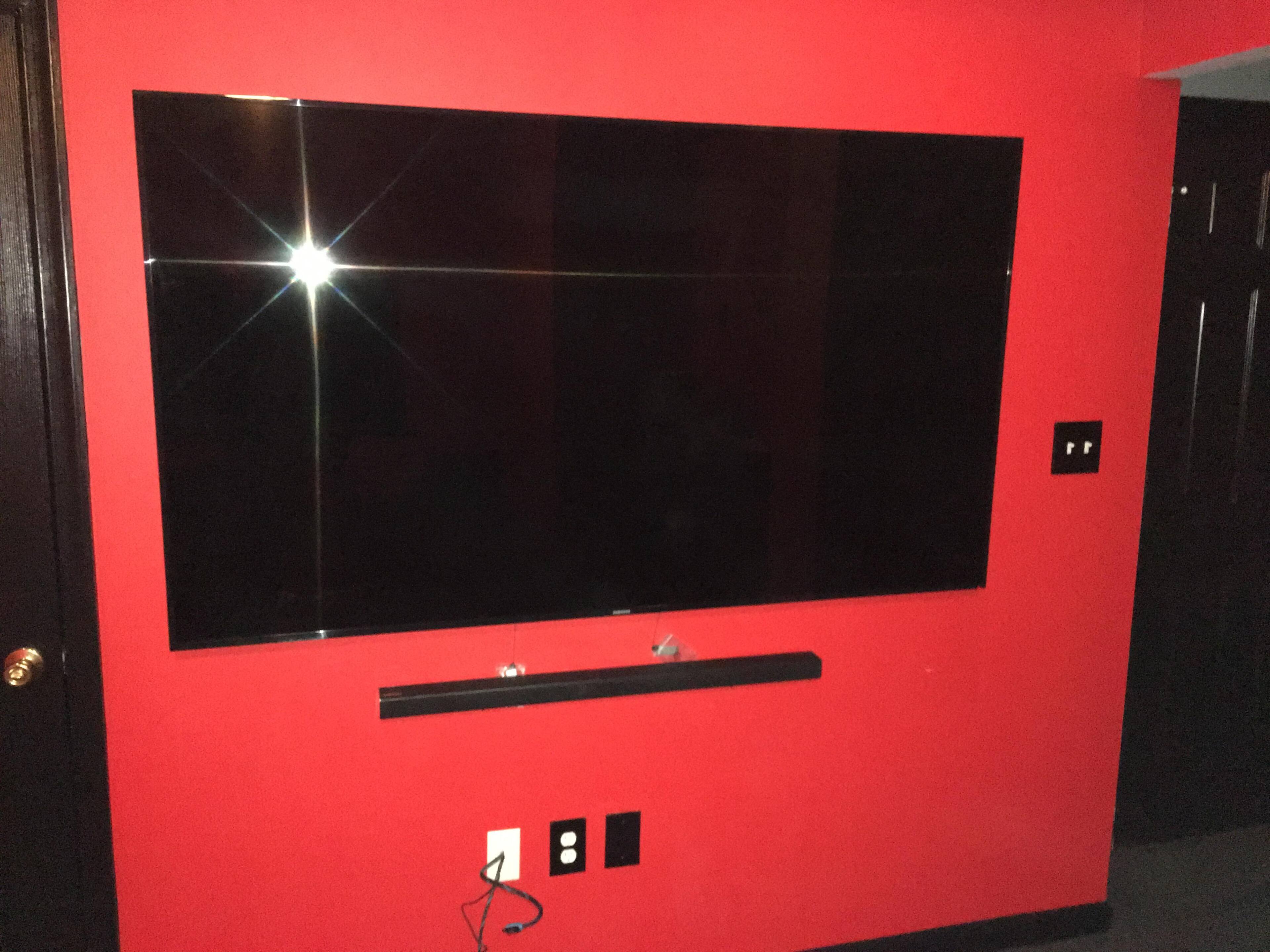 75" on the wall mount, which is great, alone with the sound bar., click to load a larger version