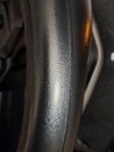It looks like there is grip but it's very minimal. It'd be a good idea to wrap it with some bicycle handlebar tape., click to load a larger version