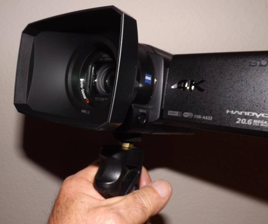 AX33 with UV filter, 16:9 lens hood, and handle., click to load a larger version