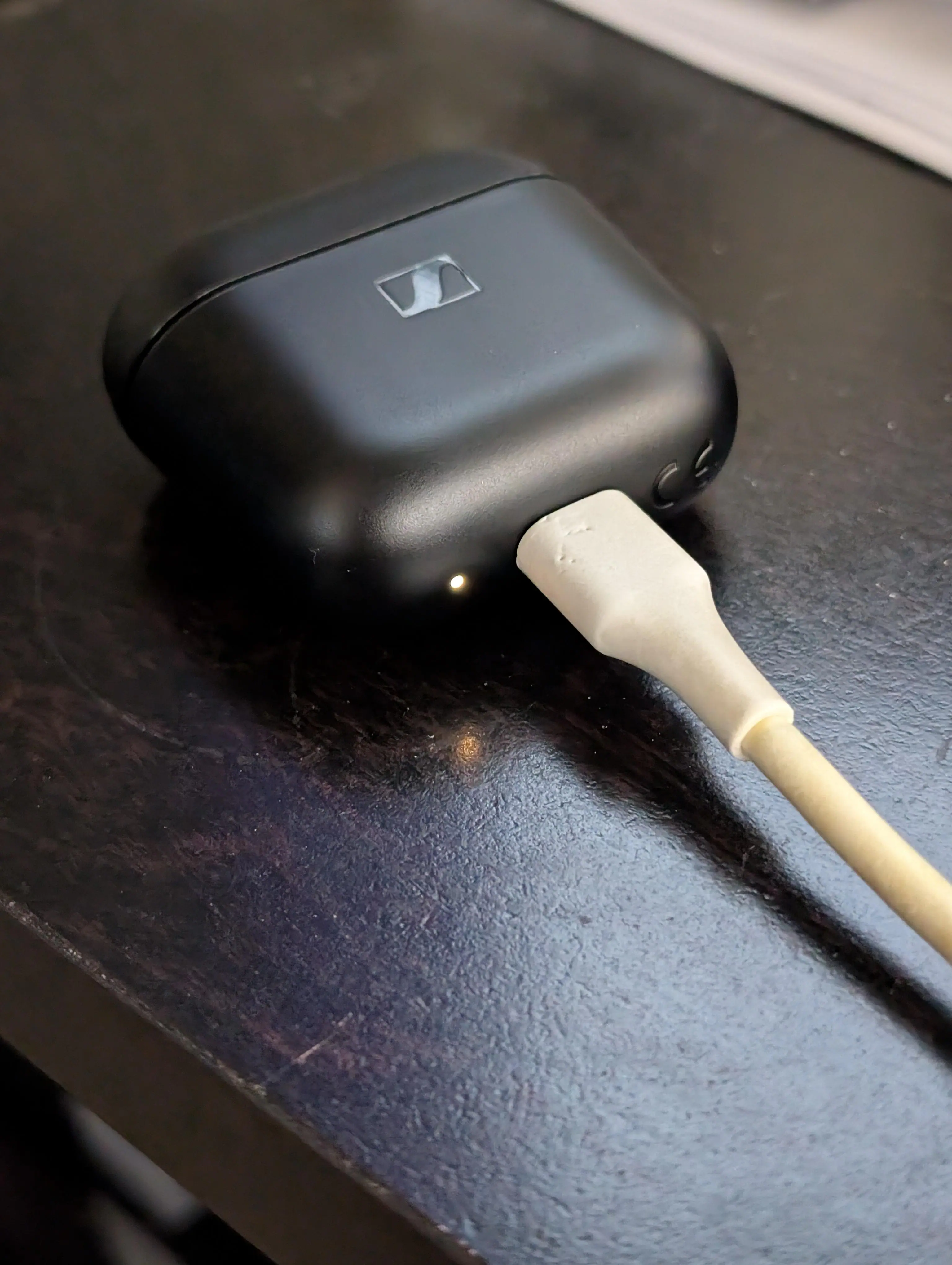 Initially skeptical of the placement of the charging indicator, but now I prefer it., click to load a larger version