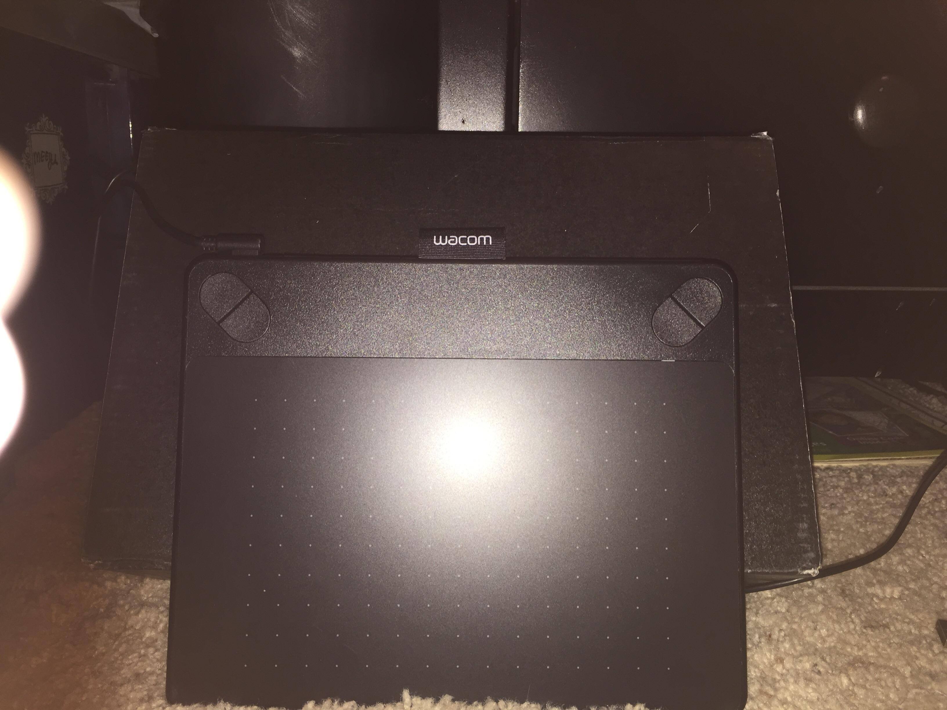 Drawing surface with mouse like tabs in the corners, click to load a larger version