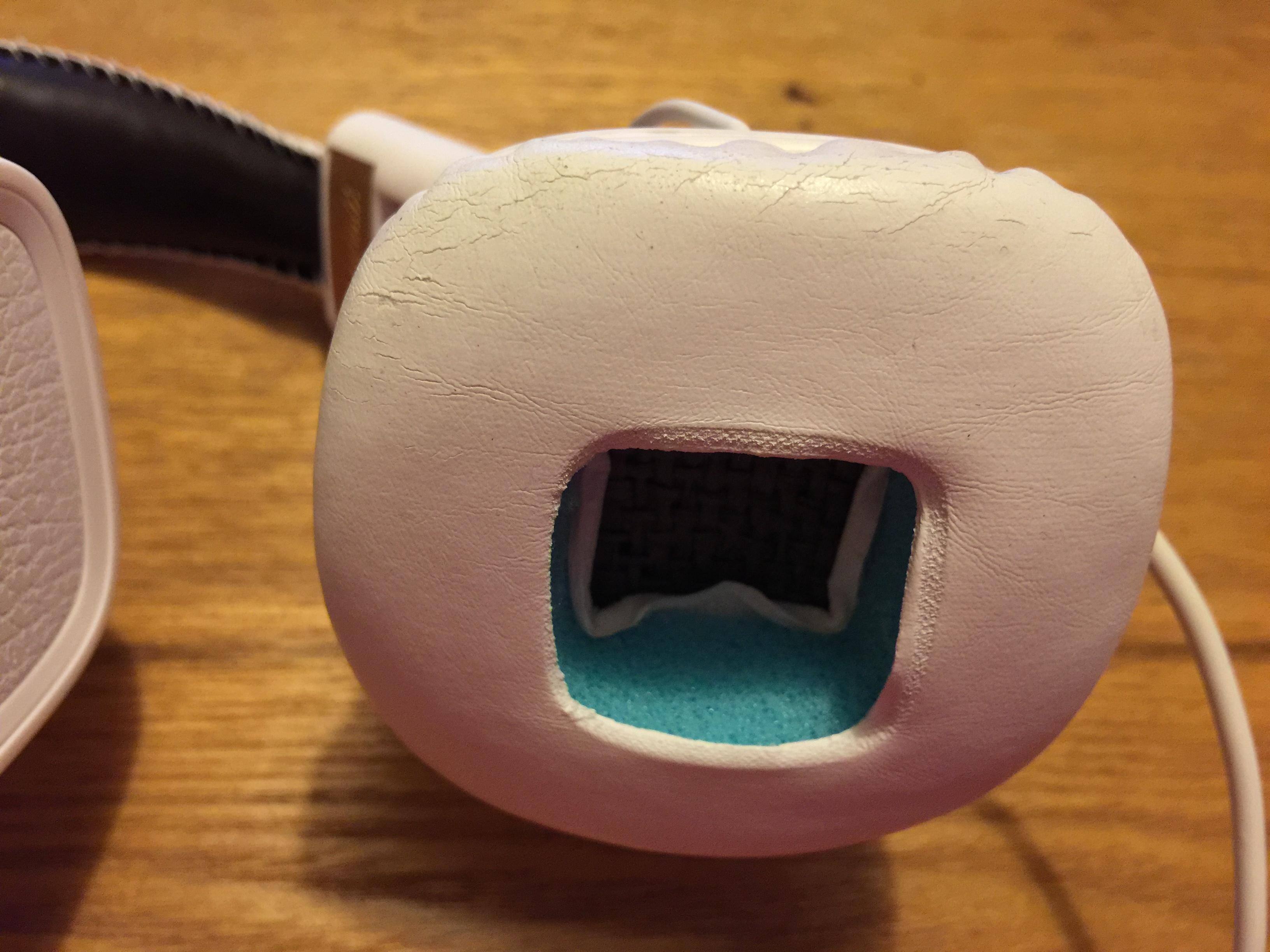 Left side - cover splitting, exposing foam, click to load a larger version