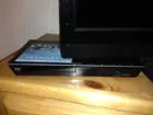 My Blu-Ray player in its home on my tiny dresser, click to load a larger version