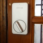 Wyze Lock installed in place of thumb latch on existing deadbolt on the inside of the door, click to load a larger version