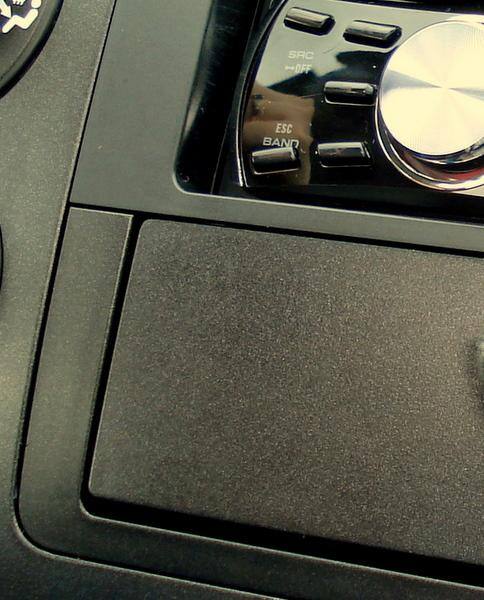 Close up comparing the color of the OEM dash pieces with this part, click to load a larger version